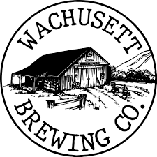 Logo of Wachusett Brewing Co. featuring a rustic barn and landscape in a circular design.